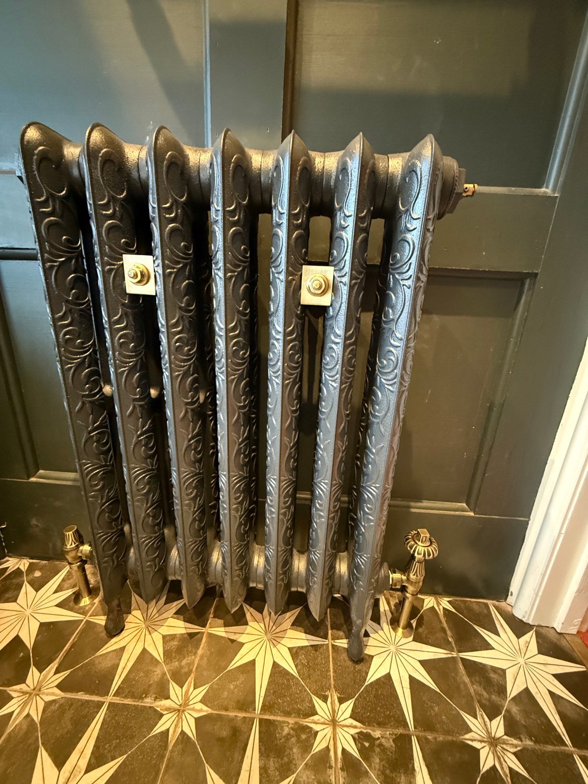 Traditional cast iron radiator restored in a period property