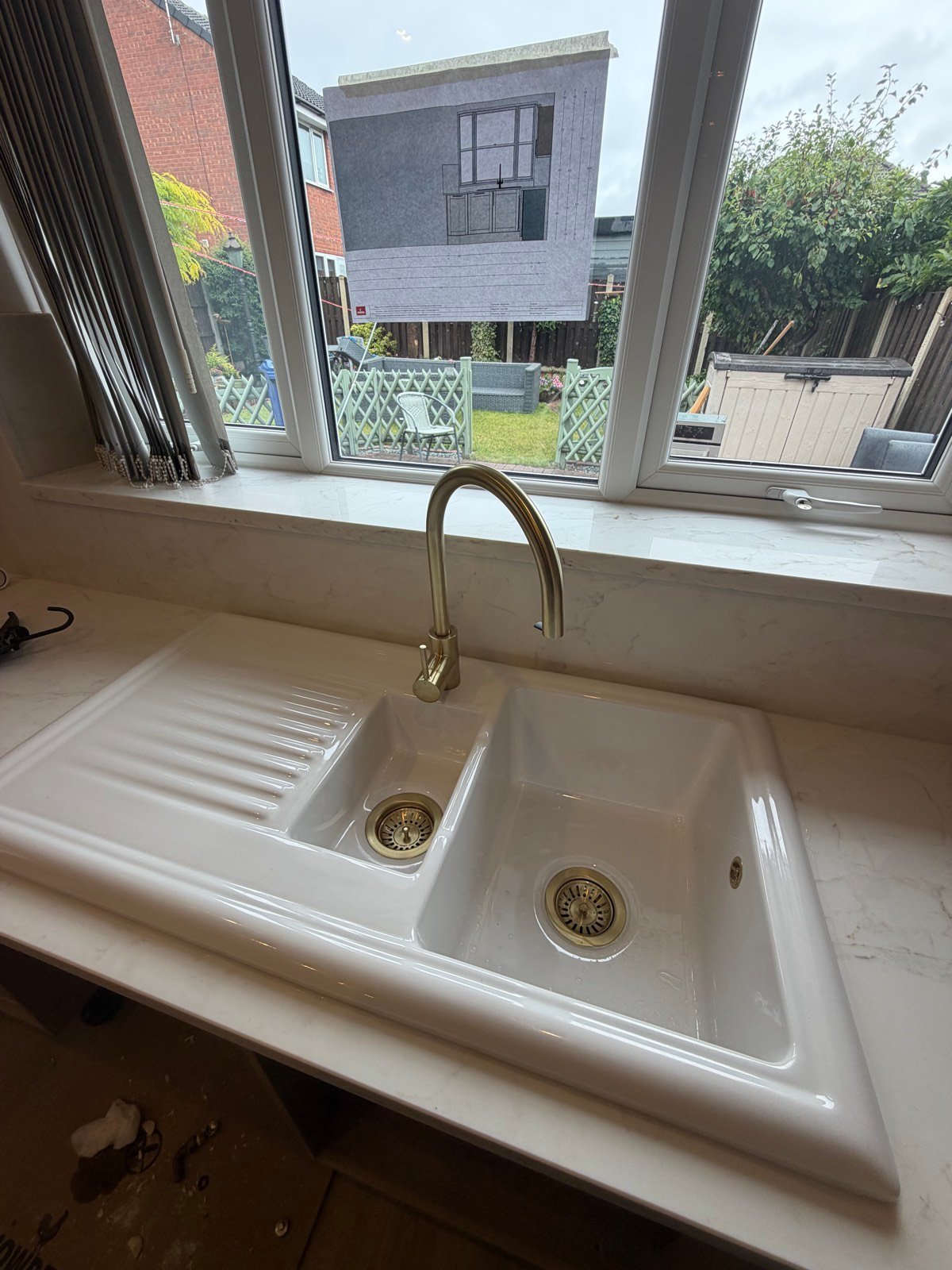 Kitchen sink and brass mixer tap installation